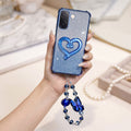 Vivo V60e 5G Luxury Shimmer Airbag Heart Stand Case with Charm Strap