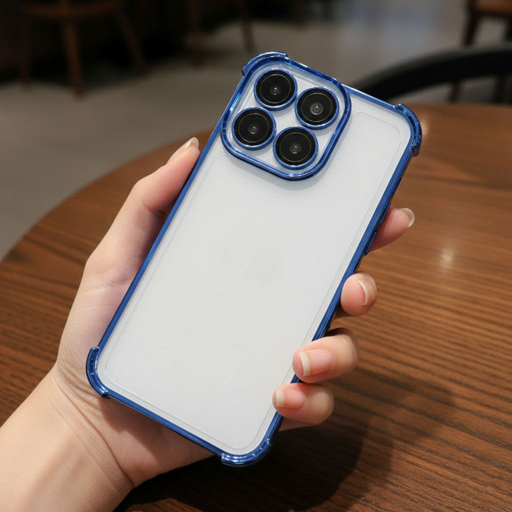 Person holding a Motorola Edge 60 Pro 5G phone with a blue case on a wooden table