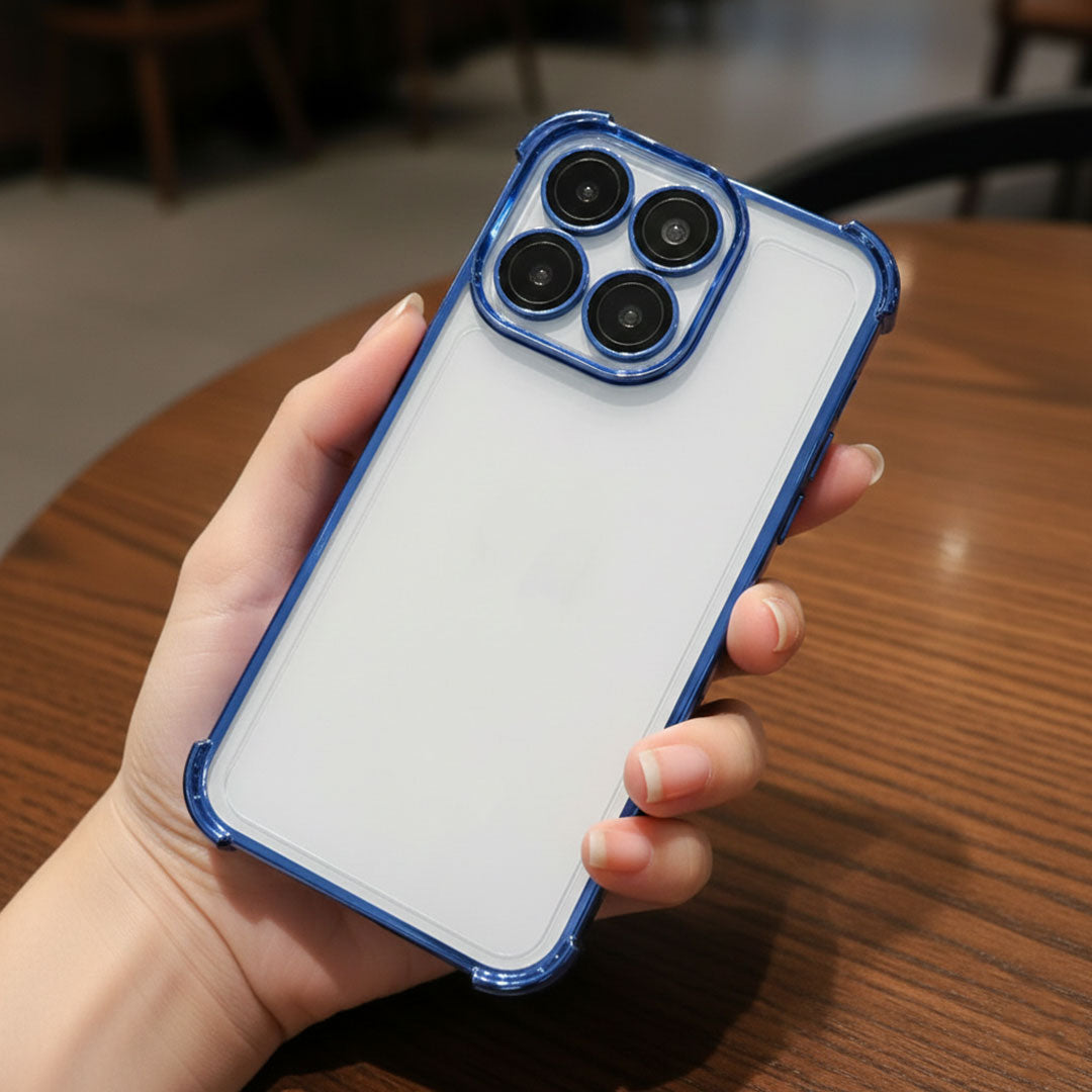 Person holding a Motorola Edge 60 Pro 5G phone with a blue case on a wooden table